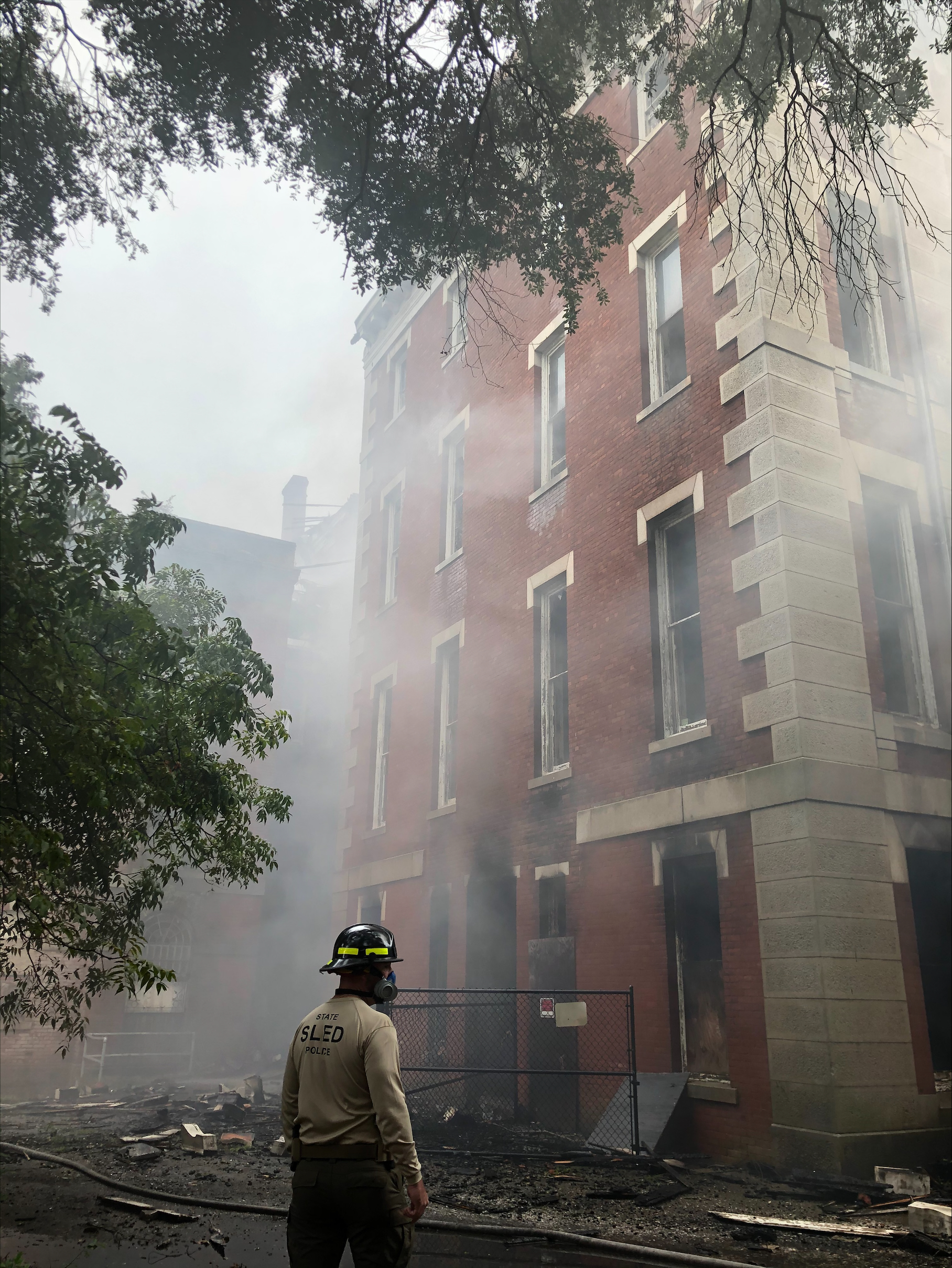 SLED Agent Investigating building